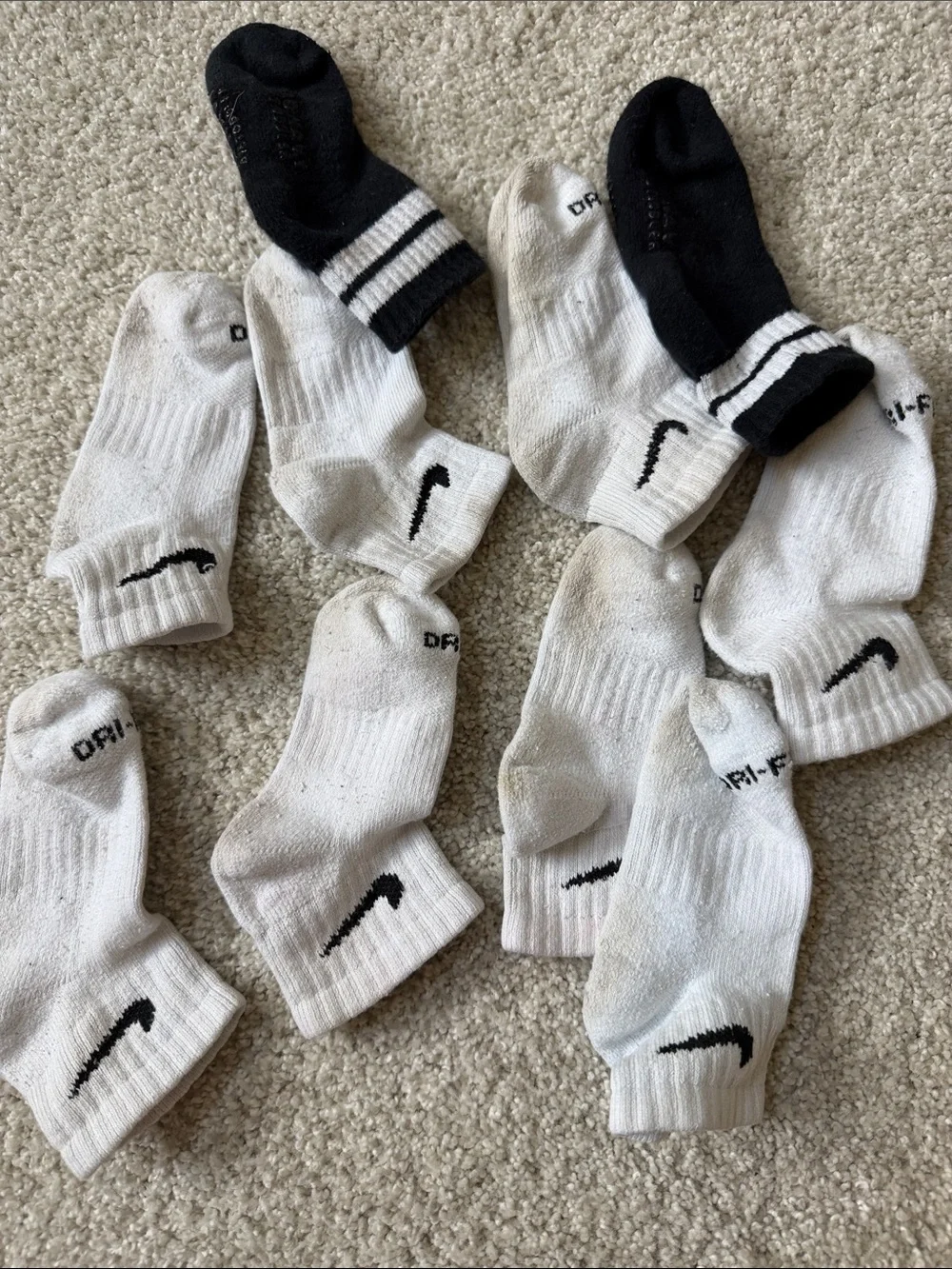 Nike White Ankle Socks w/ Black Swoosh - 4 Pack and 1 pair old navy black socks